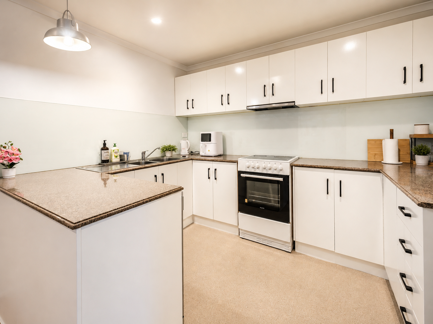 Modern kitchen in Relaxation at Rundle Mall, a Luxe-managed holiday home in Adelaide CBD, Adelaide