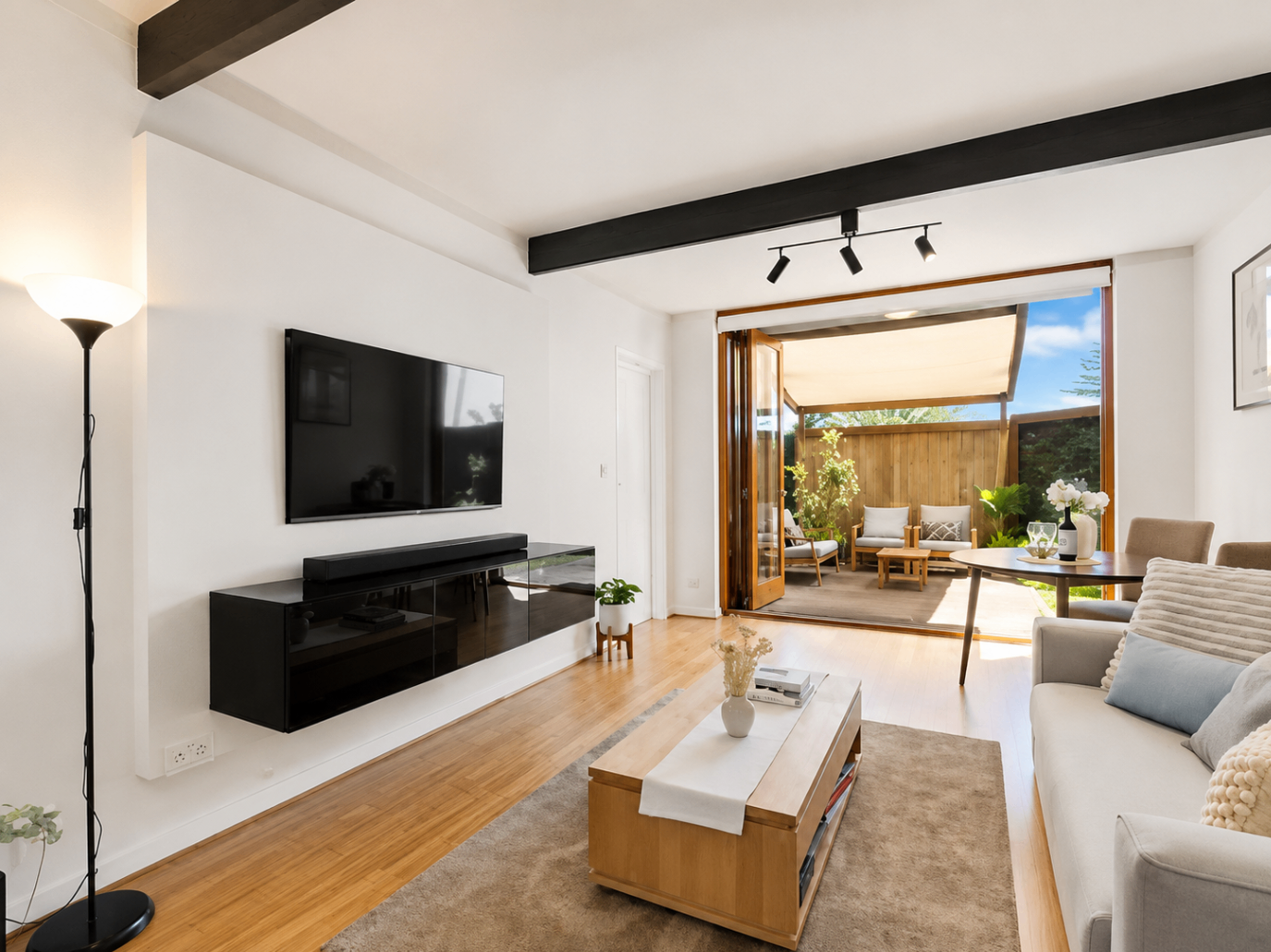 Renovated open-plan living area of Waterviews in West Beach, a Luxe-managed holiday home in West Beach, Adelaide