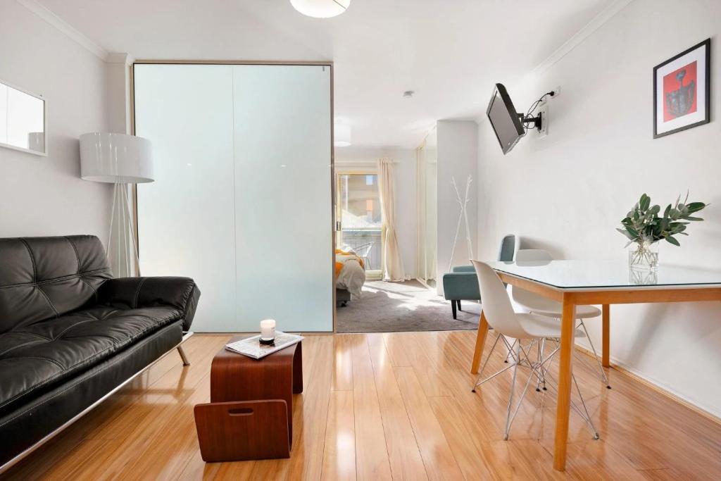 Renovated open-plan living area of Nova Street Cabin, a Luxe-managed holiday home in Adelaide CBD, Adelaide